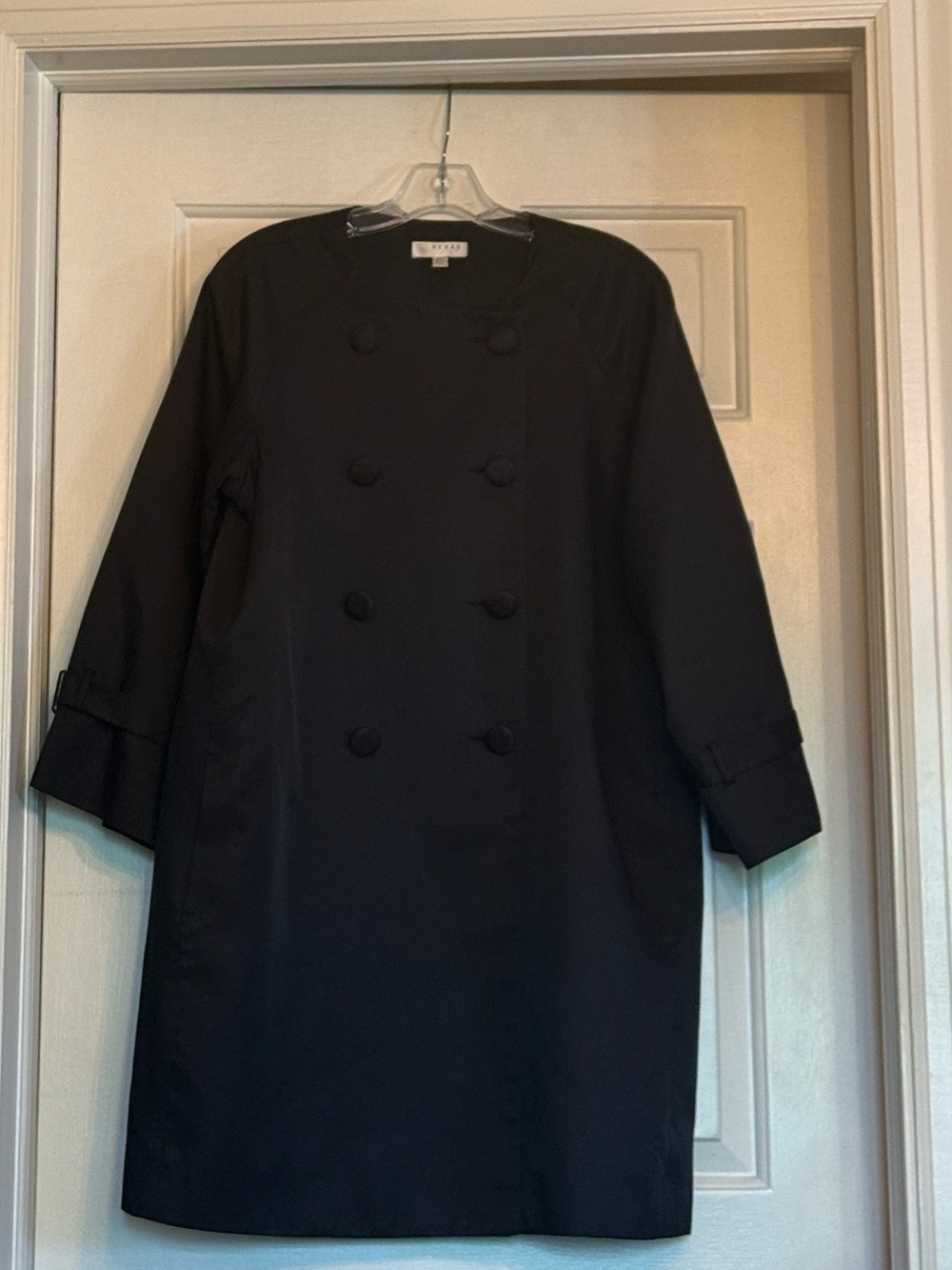 Kenar Black Double-Breasted Women’s Coat with side pockets.